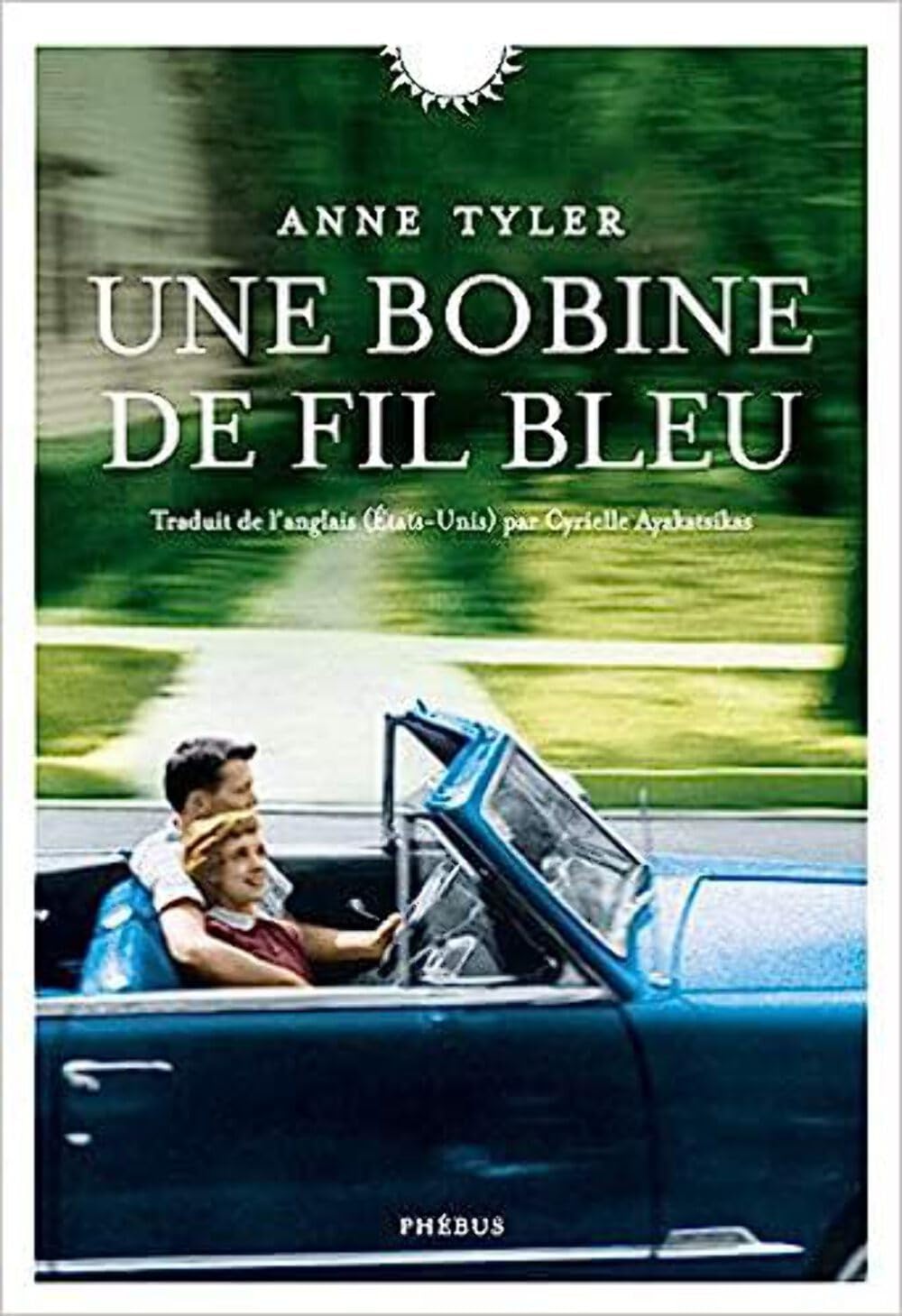 Une bobine de fil bleu 9782752910561