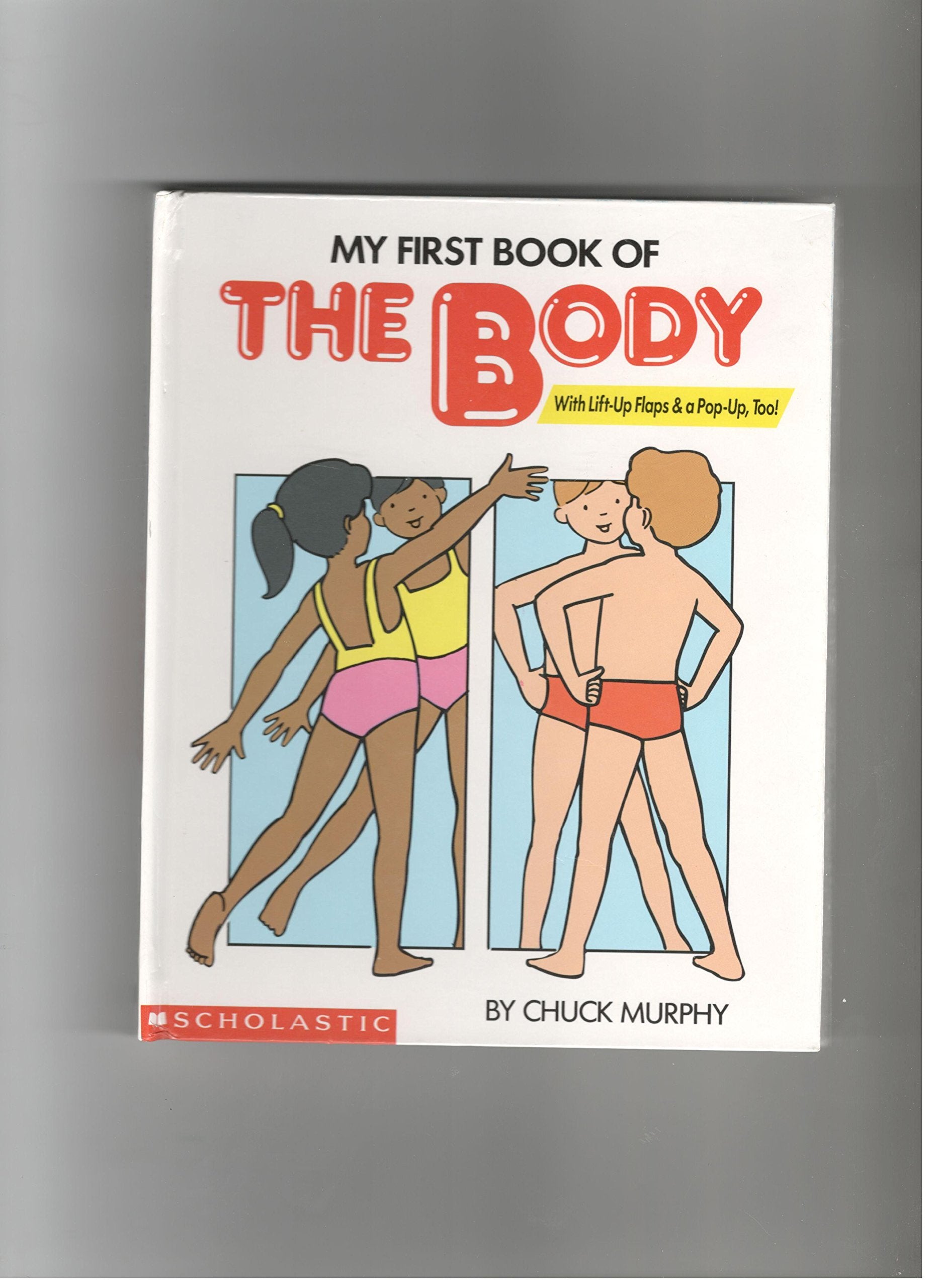 My First Book of the Body/Lift-Up and Pop-Up Book Pop-Up, Too) 9780590203159