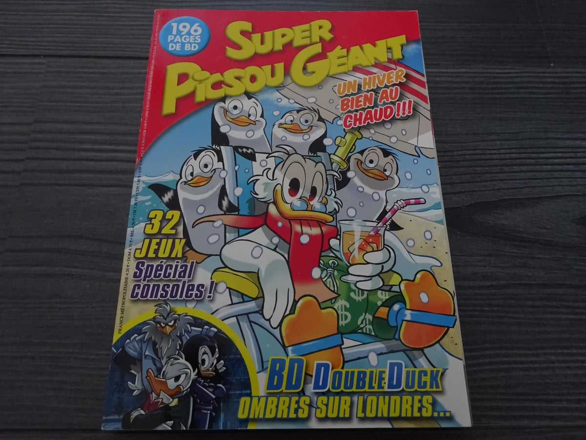 SUPER PICSOU GEANT NUMERO 173 . UN HIVER BIEN AU CHAUD . 32 JEUX SPECIAL CONSOLES . BD DOUBLE DUCK OMBRES SUR LONDRES 0262207574207