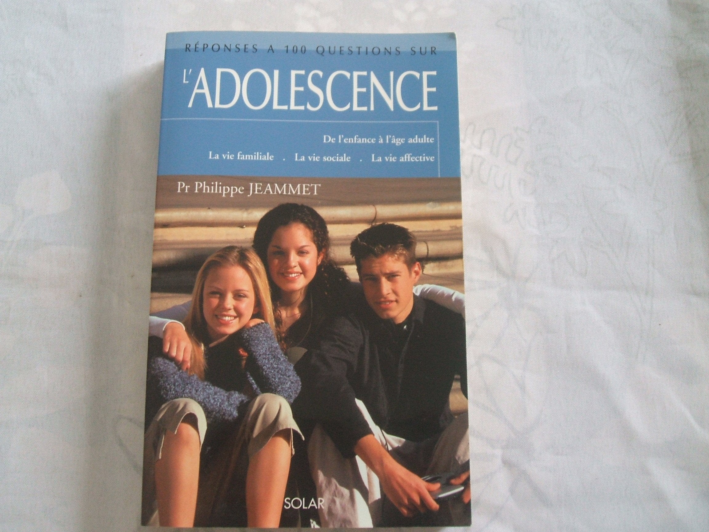 Réponses a 100 questions sur l'adolescence 9782744155147