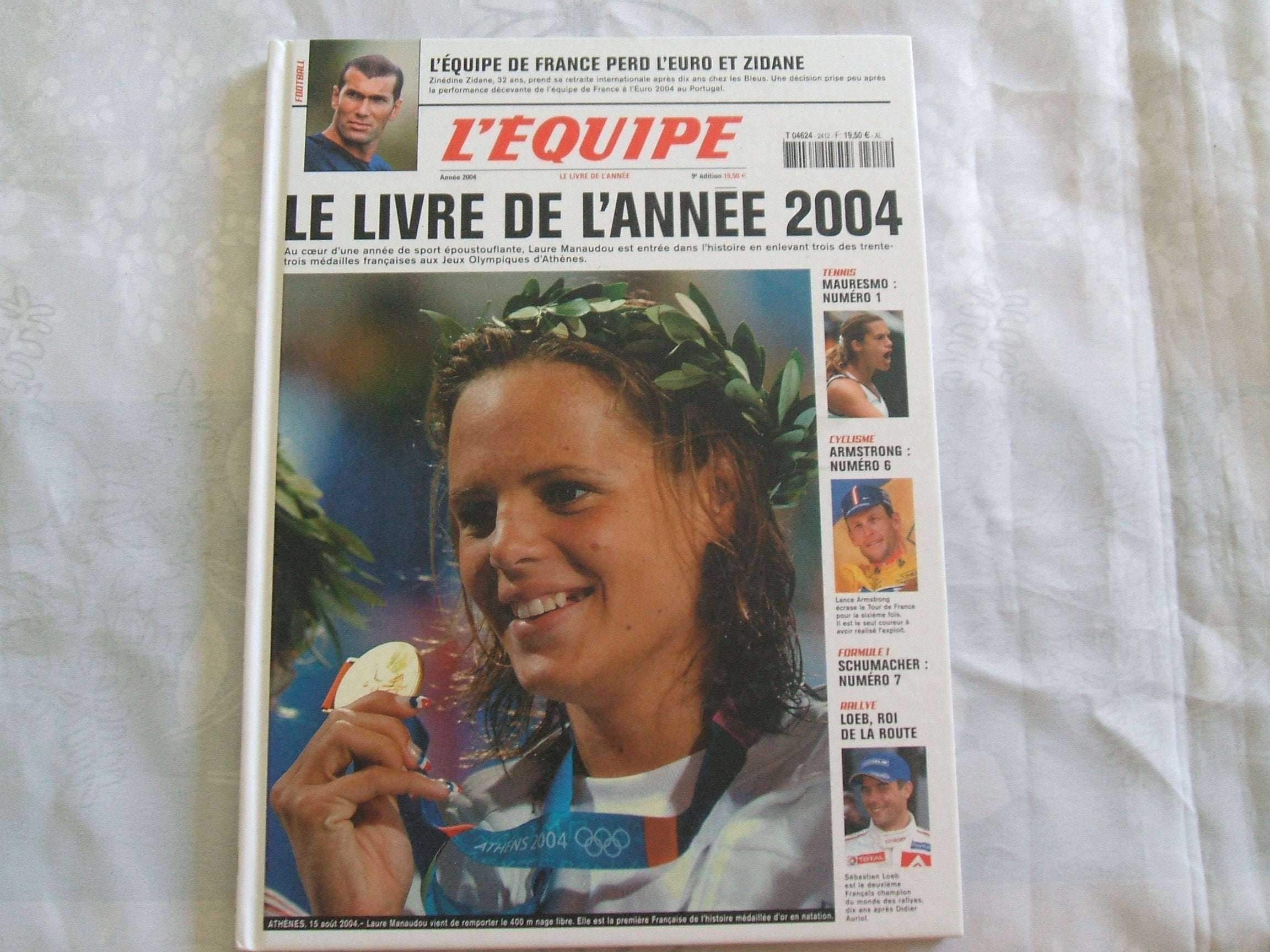 Le livre de l'année 2004 : Un an de reportage des journalistes de L'Équipe 9782951960565