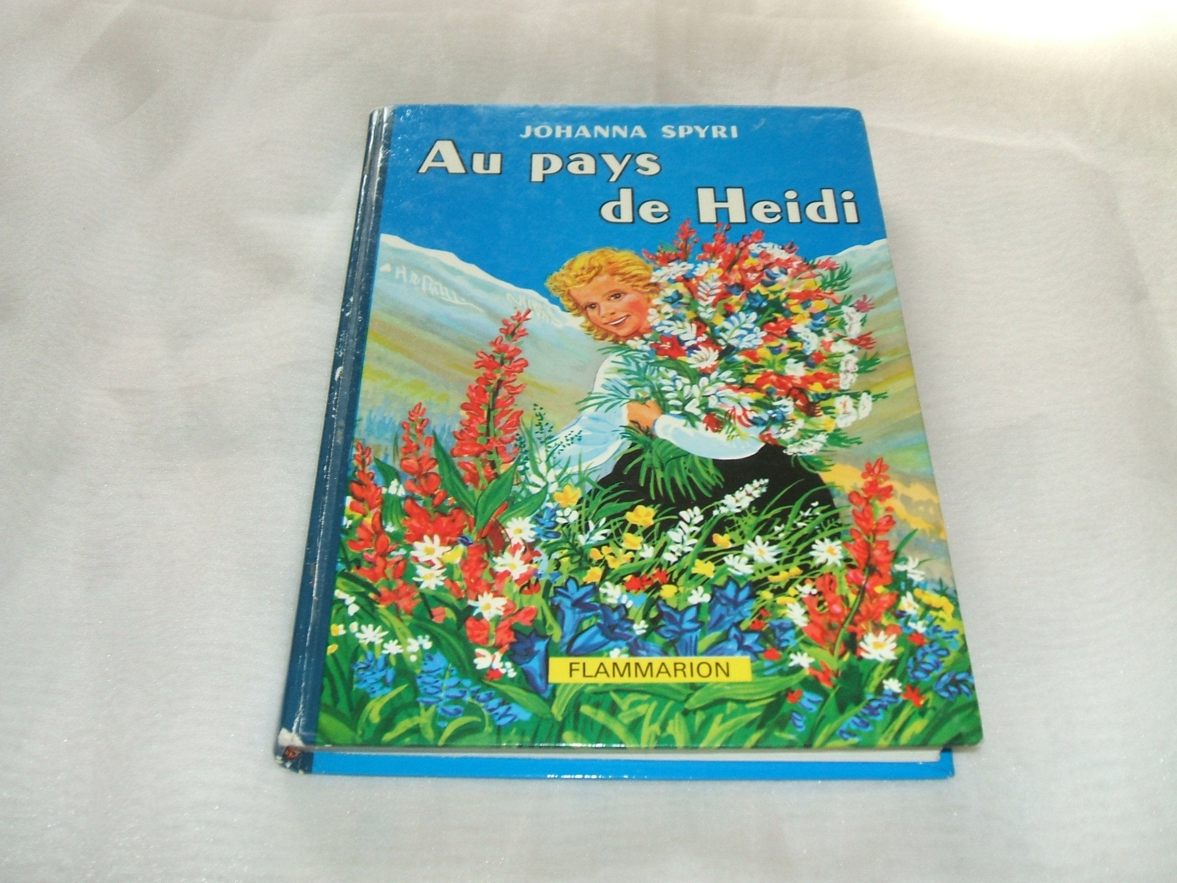 Johanna Spyri. Au pays de Heidi : . Traduction de Charles Tritten. Adaptation nouvelle. Illustrations de Minot