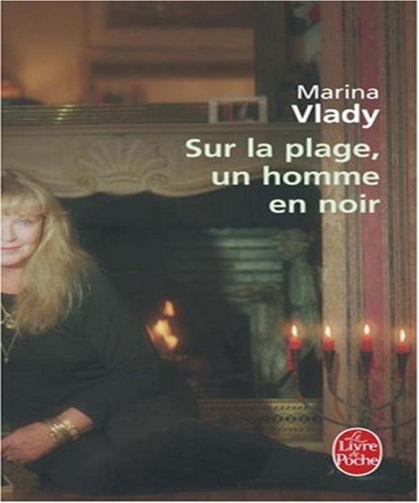 Sur la plage, un homme en noir 9782253120216