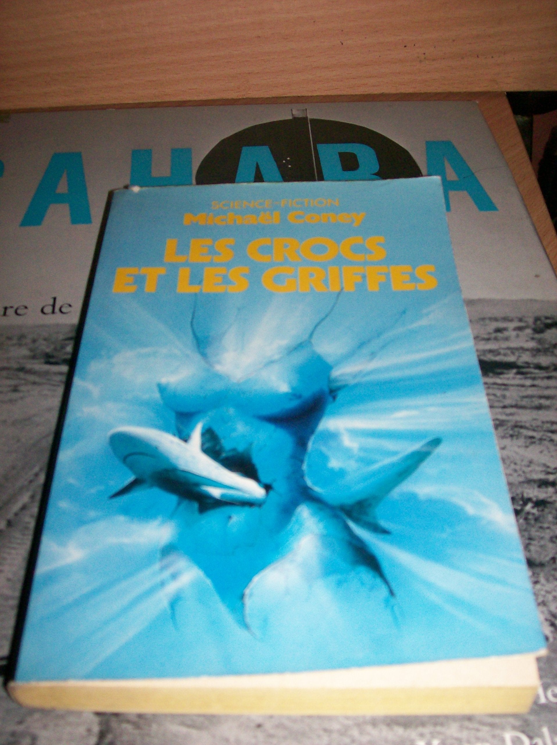 Les crocs et les griffes / roman 9782266016643